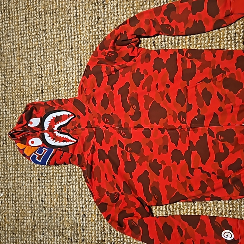A bathing ape jacket. Fits like a large. If you need measurements, let me know.